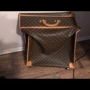 Louis Vuitton rolling garment bag. 24” h